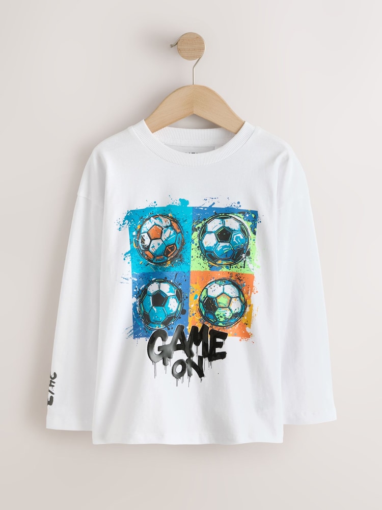 White Football Relaxed Fit Graphic Long Sleeve Cotton T-Shirt (3-16yrs) - Image 1 of 5 White Football Relaxed Fit Graphic Long Sleeve Cotton T-Shirt (3-16yrs) - Image 1 of 5