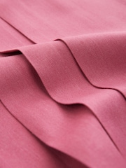 Rosa - Schulkleid mit langer Schürze und asymmetrisch versetzter Knopfleiste (3–14 Jahre) - Bild 7 von 8
