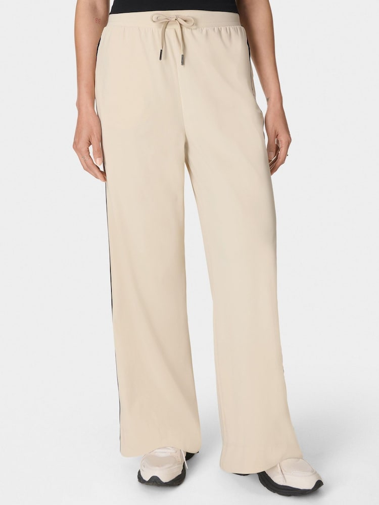 Sweaty Betty Cream Explorer Wide Leg Trousers - Image 1 of 7