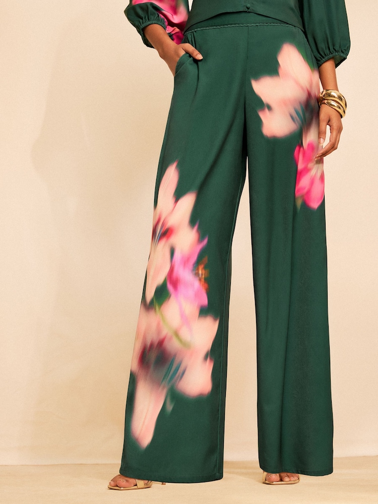 Love & Roses X RHS Green Blurred Floral Placement Print Trousers - Image 1 of 5