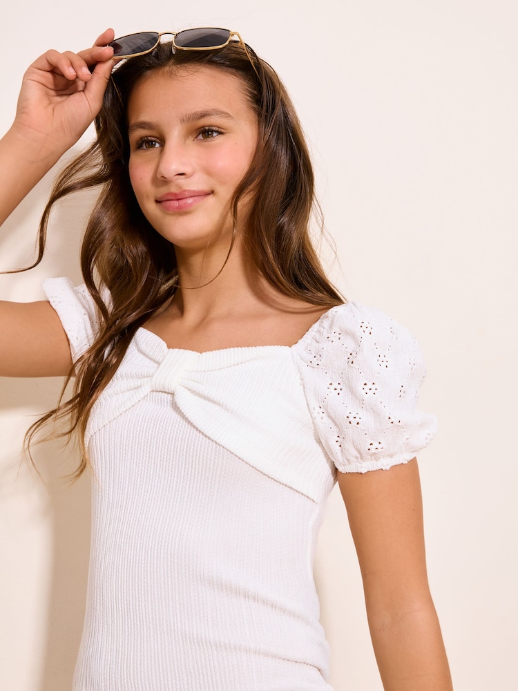 Lipsy White Brodierie Teen Bow Bodycon Dress (9-16yrs) - Image 2 of 4 Lipsy White Brodierie Teen Bow Bodycon Dress (9-16yrs) - Image 2 of 4