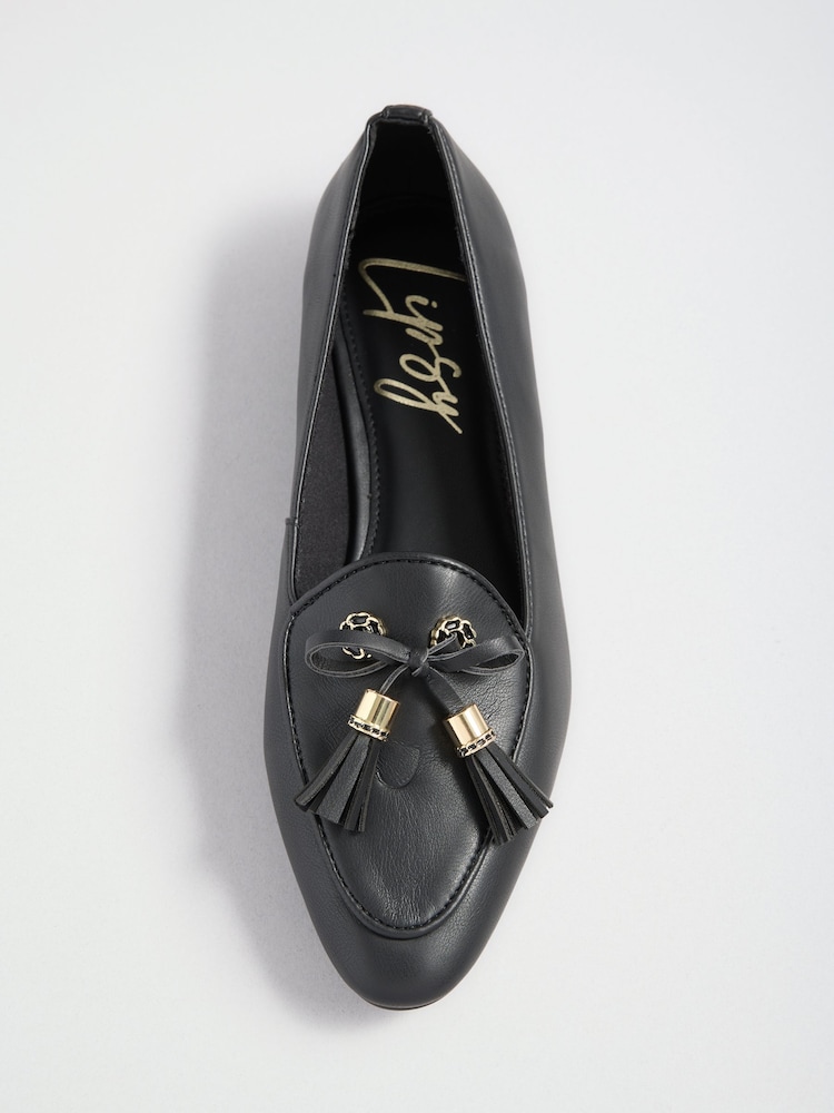 Lipsy Black Faux Leather Tassel Bow Hardware Trim Slipper Loafers - Image 1 of 5 Lipsy Black Faux Leather Tassel Bow Hardware Trim Slipper Loafers - Image 1 of 5