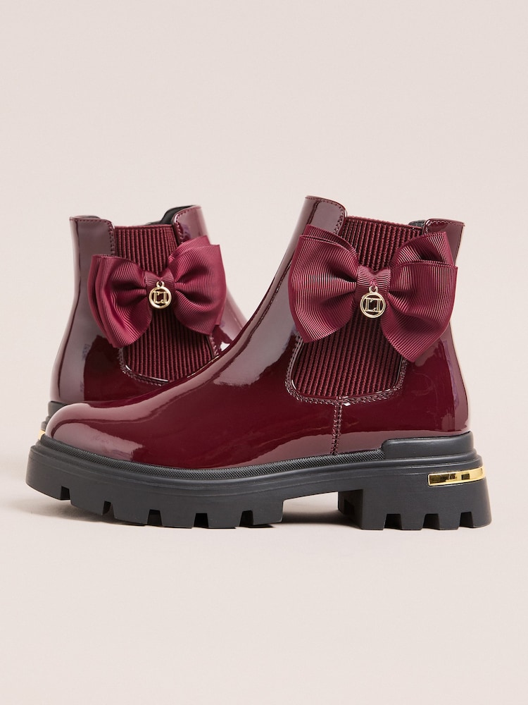 Lipsy Burgundy Red Black Patent Faux Leather Bow Elasticated Heel Clip Ankle Chelsea Boots - Image 2 of 5 Lipsy Burgundy Red Black Patent Faux Leather Bow Elasticated Heel Clip Ankle Chelsea Boots - Image 2 of 5