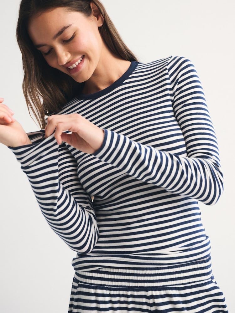 Πλεκτό μπλουζάκι Abercrombie & Fitch με Μακρύ μανίκι και σχέδιο Cozy Lounge - Εικόνα 1 από 6