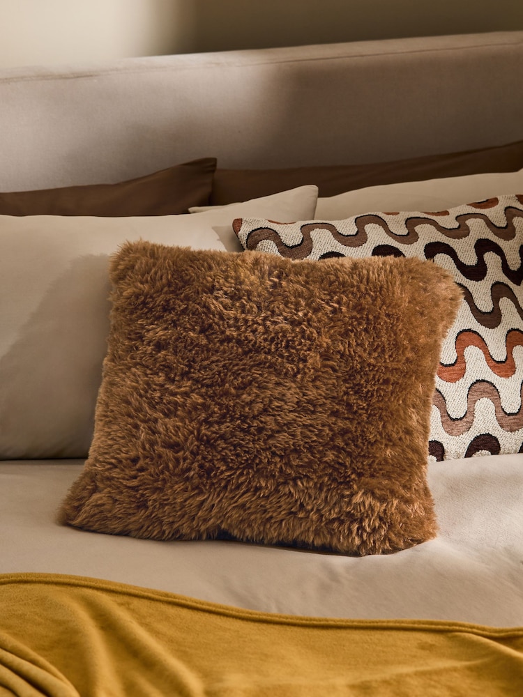 Caramel Brown Faux Fur 50 x 50cm Shearling Cushion - Image 1 of 4 Caramel Brown Faux Fur 50 x 50cm Shearling Cushion - Image 1 of 4