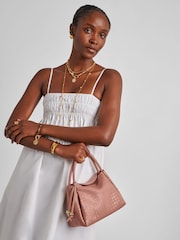 وردي - حقيبة بيد علوية بنسيج منسوج Nova من Katie Loxton - Image 1 of 5