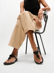 FitFlop Black Solay Glossy-Disc Toe-Post Sandals - Image 1 of 3