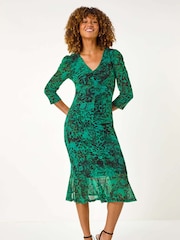 Vestido de malla estampada a media pierna de Roman - Imagen 1 de 5