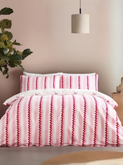 Chelsea Peers Pink Cotton Wavy Stripe and Bow Print Reversible Bedding Set - Image 1 of 3