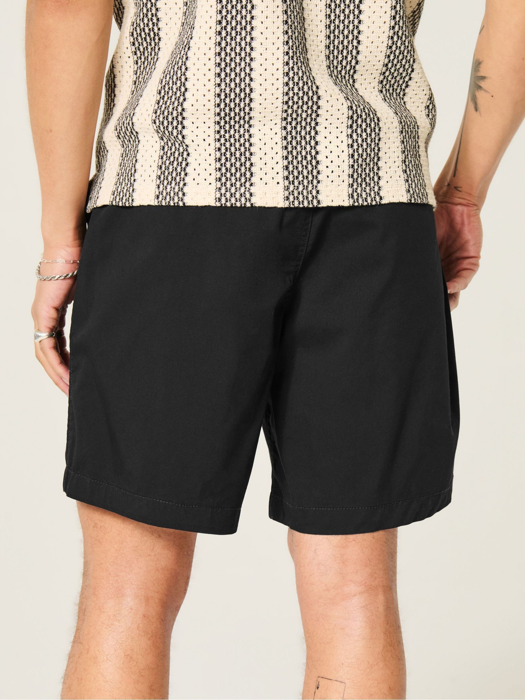 Buy Hollister Black Mid-Thigh Hybrid Active Shorts from Next USA