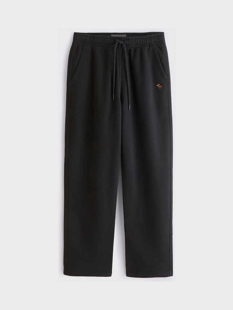 Abercrombie & Fitch Black Icon Baggy Open Hem Joggers - Image 1 of 2 Abercrombie & Fitch Black Icon Baggy Open Hem Joggers - Image 1 of 2
