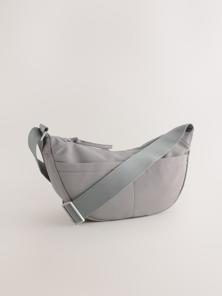 Grey Nylon Sling Cross Body Bag - Image 1 of 5 Grey Nylon Sling Cross Body Bag - Image 1 of 5