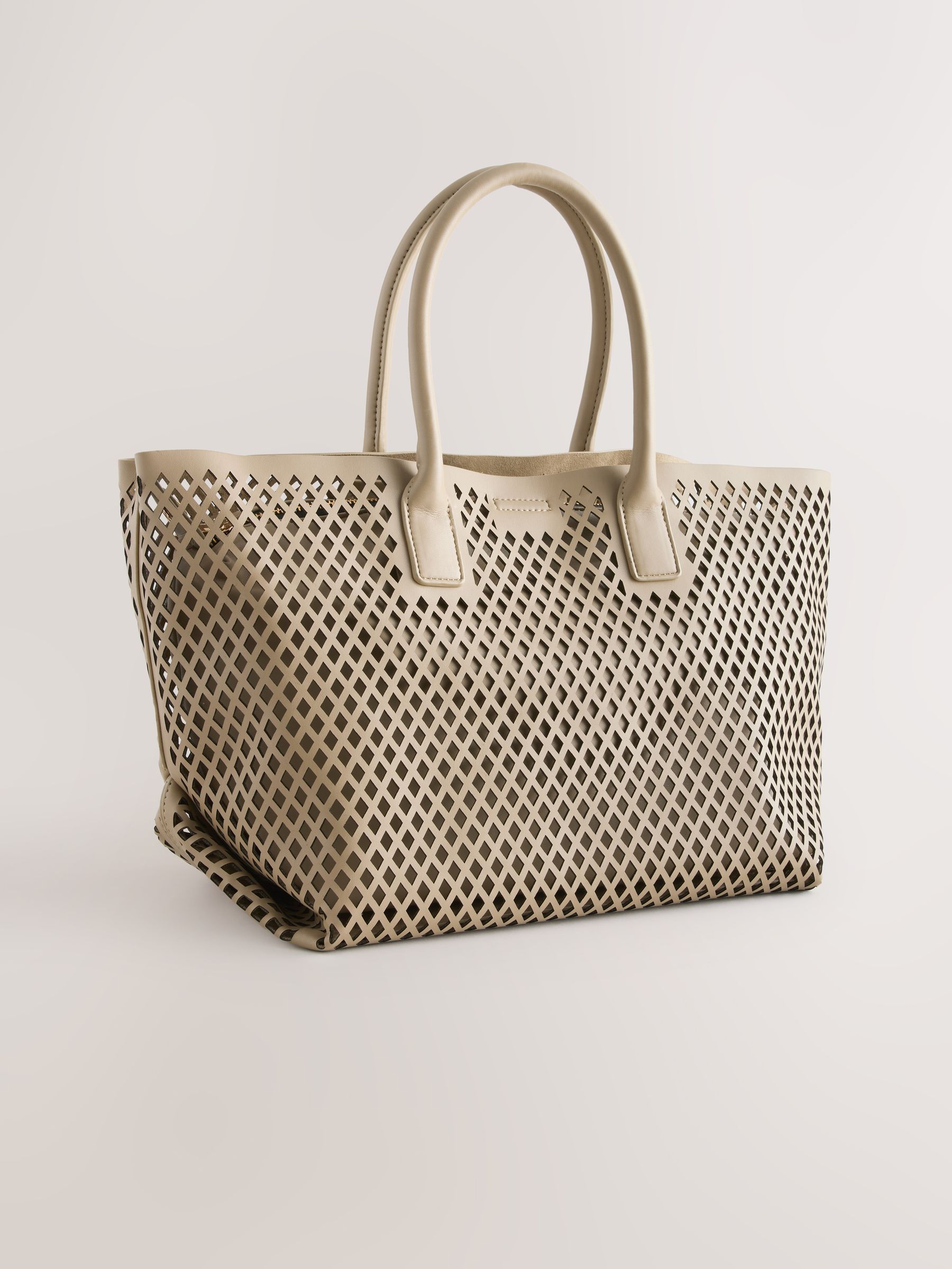 Buy Taupe Laser Cut Slouchy Hand Held Bag from the Next UK online shop