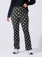 Yours Curve Black Limited Polka Dot Flared Trousers - Image 1 of 5