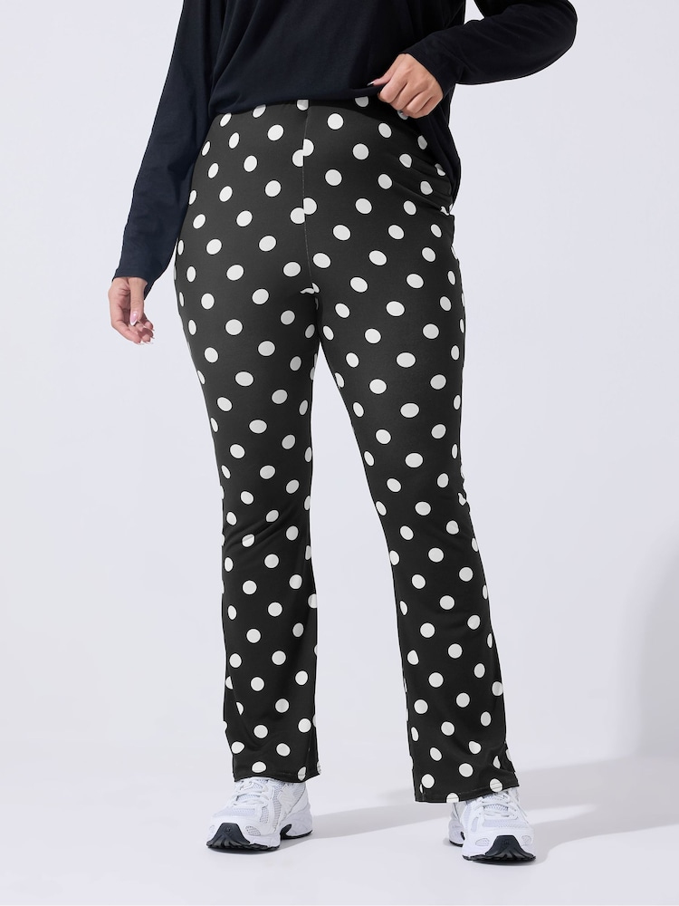 Yours Curve Black Limited Polka Dot Flared Trousers - Image 1 of 5