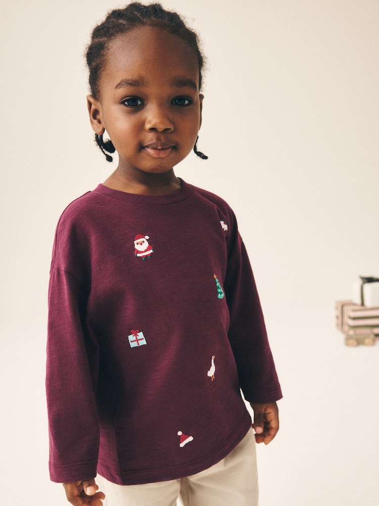Berry Red All over Embroidered Long Sleeve Christmas T-Shirt (3mths-7yrs) - Image 1 of 8 Berry Red All over Embroidered Long Sleeve Christmas T-Shirt (3mths-7yrs) - Image 1 of 8