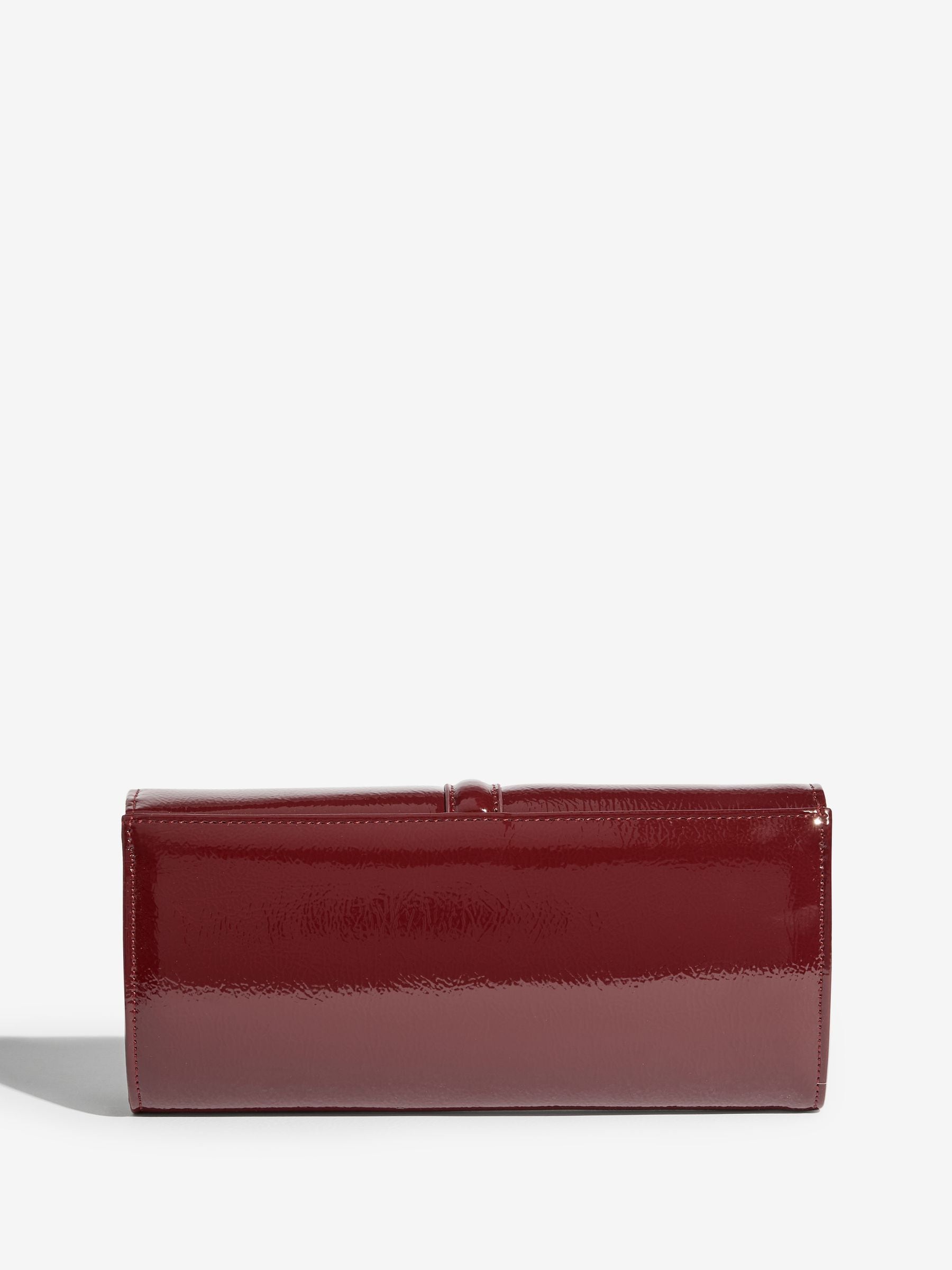 Buy Lipsy Burgundy Red Tassel Trim Clutch Bag from Next Canada
