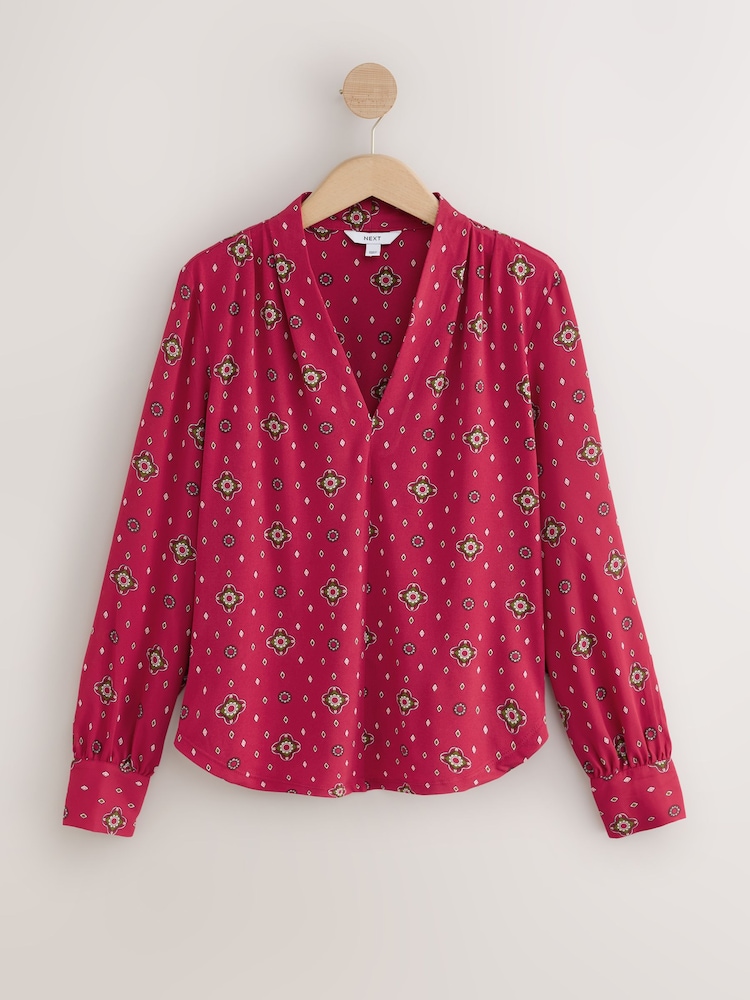 Red Print Long Sleeved V-Neck Cuff Top - Image 1 of 3 Red Print Long Sleeved V-Neck Cuff Top - Image 1 of 3