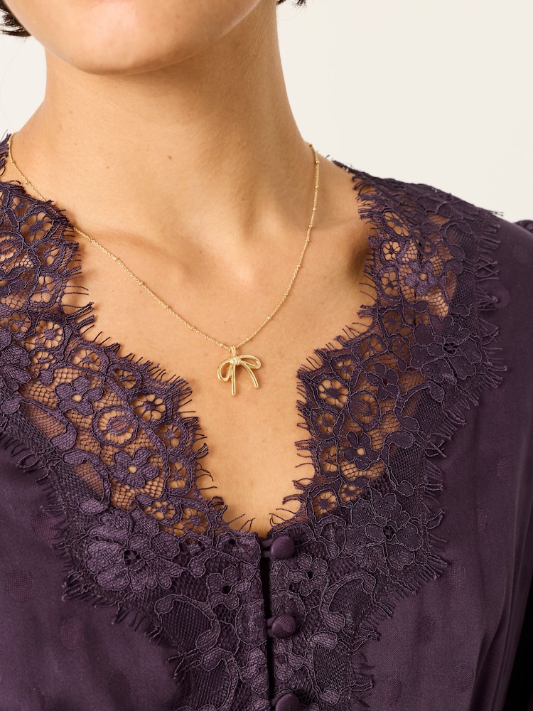 FatFace Gold Tone Bow Nacklace - Image 1 of 4 FatFace Gold Tone Bow Nacklace - Image 1 of 4