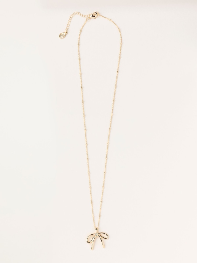 FatFace Gold Tone Bow Nacklace - Image 2 of 4 FatFace Gold Tone Bow Nacklace - Image 2 of 4