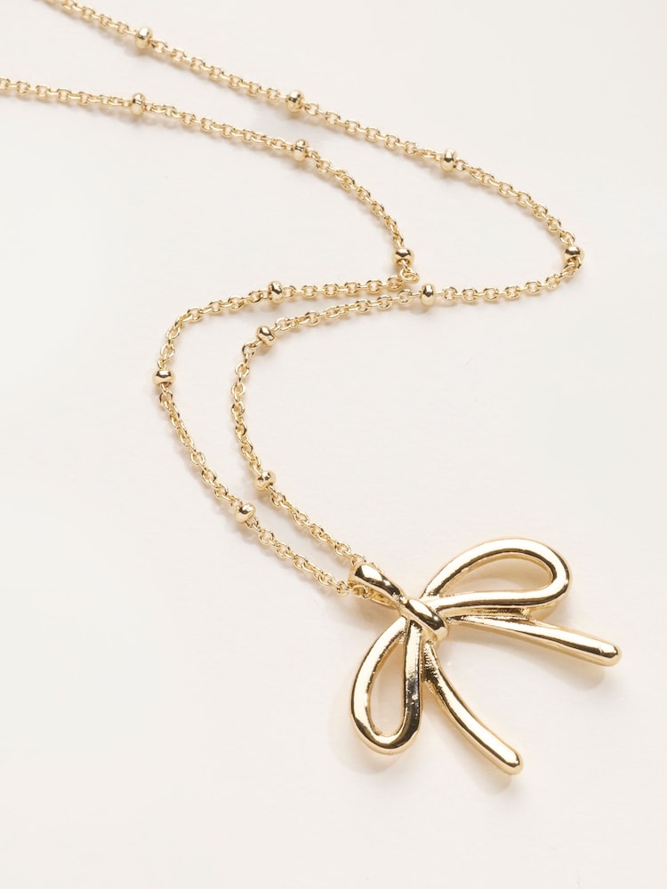 FatFace Gold Tone Bow Nacklace - Image 4 of 4 FatFace Gold Tone Bow Nacklace - Image 4 of 4