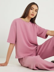 تيشرت فاخر بقصّة واسعة وبكُم قصير من River Island - صورة 1 من 3