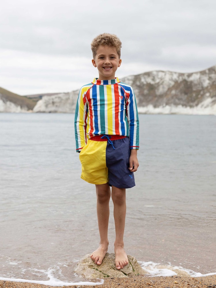 לבן - גופיית גלישה עשויה בד המגן מפני קרינת השמש UV לבנים של Muddy Puddles - תמונה 1 מתוך 5 לבן - גופיית גלישה עשויה בד המגן מפני קרינת השמש UV לבנים של Muddy Puddles - תמונה 1 מתוך 5