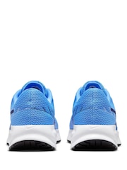 Estilo universitario en azul - Zapatillas para correr Run Defy Road de Nike - Imagen 7 de 10