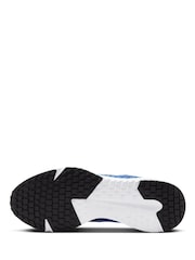 Estilo universitario en azul - Zapatillas para correr Run Defy Road de Nike - Imagen 8 de 10