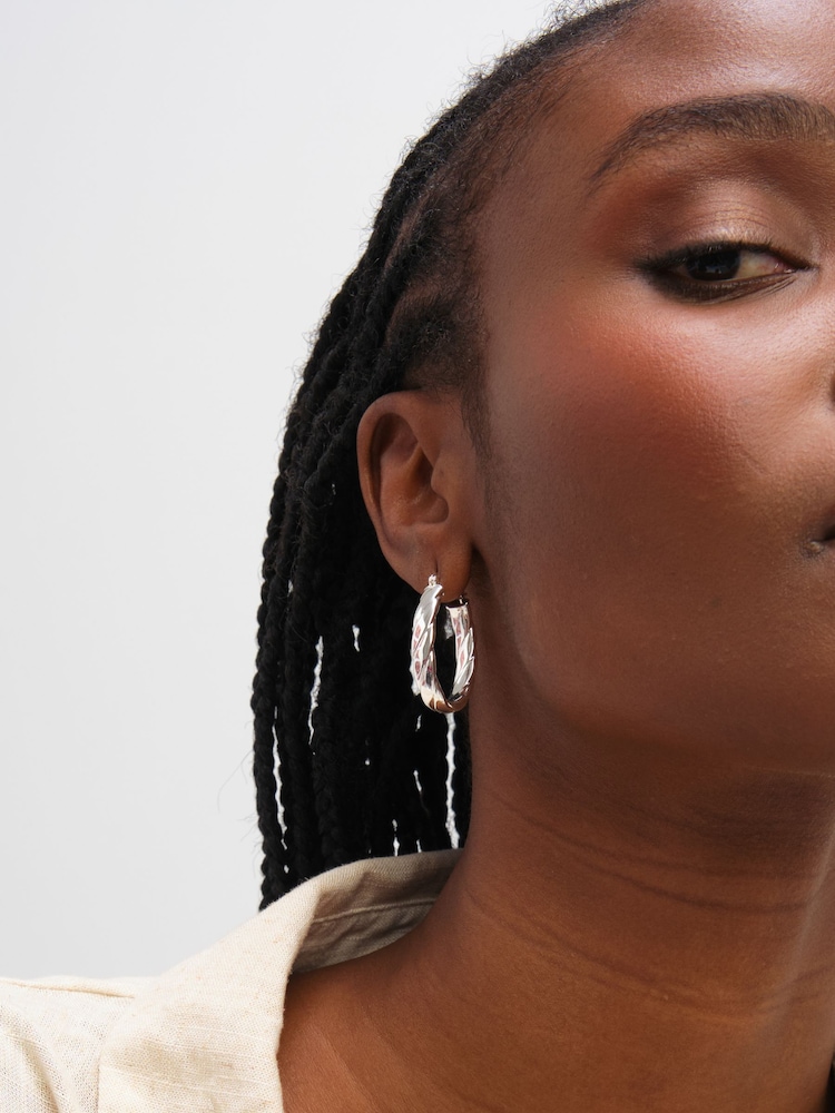 Inicio Sterling Silver Plated Polished Textured Oval Hoop Earrings - Image 2 of 3