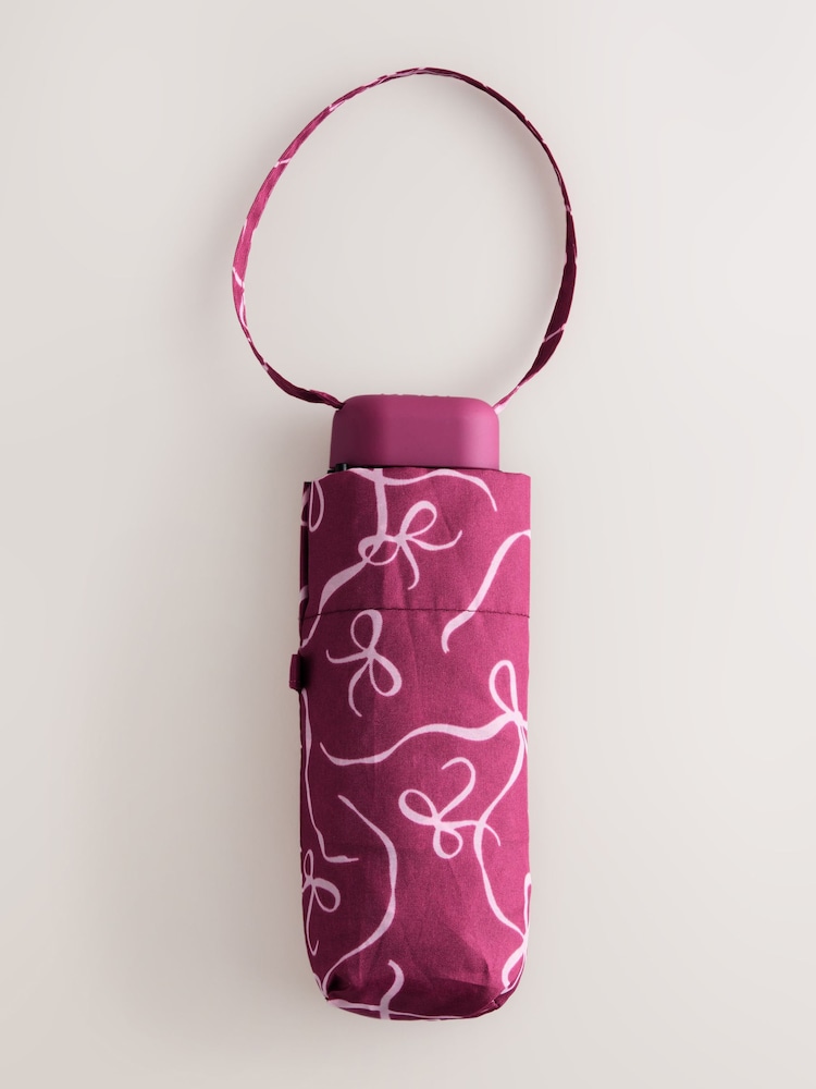 Pink Bow Print Compact Umbrella - Image 1 of 4