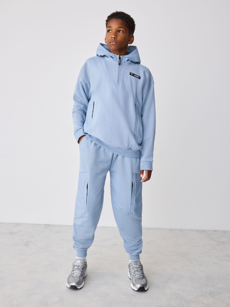 Baker by Ted Baker Blue Oversized Blue Funnel Neck Hoodie and Joggers Set - Image 1 of 7 Baker by Ted Baker Blue Oversized Blue Funnel Neck Hoodie and Joggers Set - Image 1 of 7