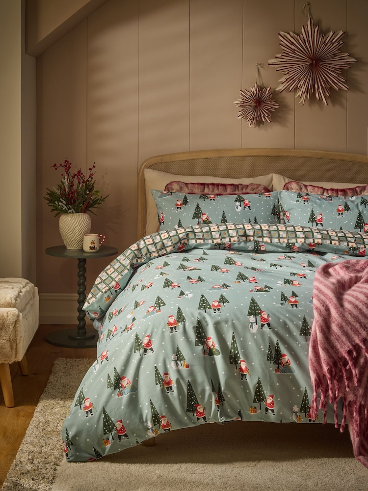 Green Santa Christmas Reversible Duvet Cover and Pillowcase Set - Image 1 of 5 Green Santa Christmas Reversible Duvet Cover and Pillowcase Set - Image 1 of 5