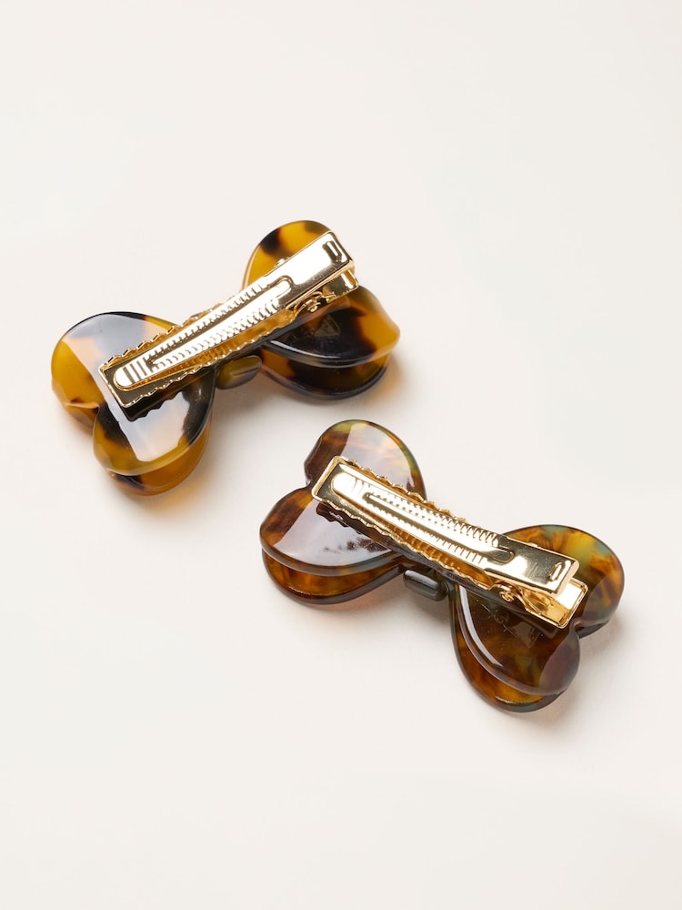 FatFace 2 Pack Tortoiseshell Brown Bow Resin Hair Slides - Image 2 of 2 FatFace 2 Pack Tortoiseshell Brown Bow Resin Hair Slides - Image 2 of 2