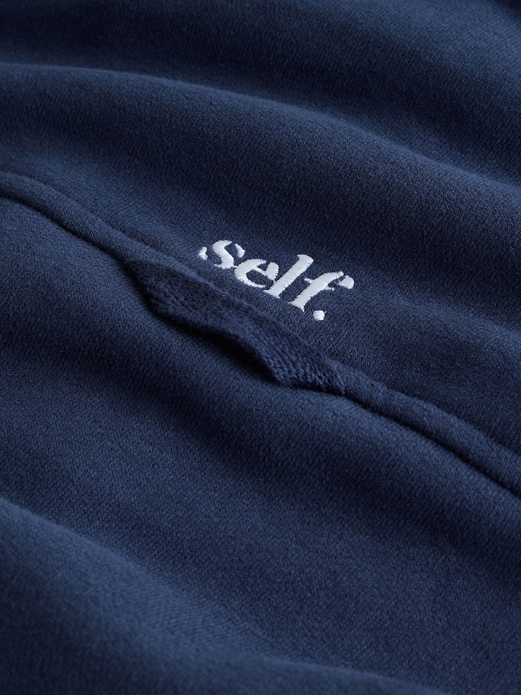 أزرق داكن - من self. سويت شيرت بنصف سحاب - Image 10 of 10 أزرق داكن - من self. سويت شيرت بنصف سحاب - Image 10 of 10