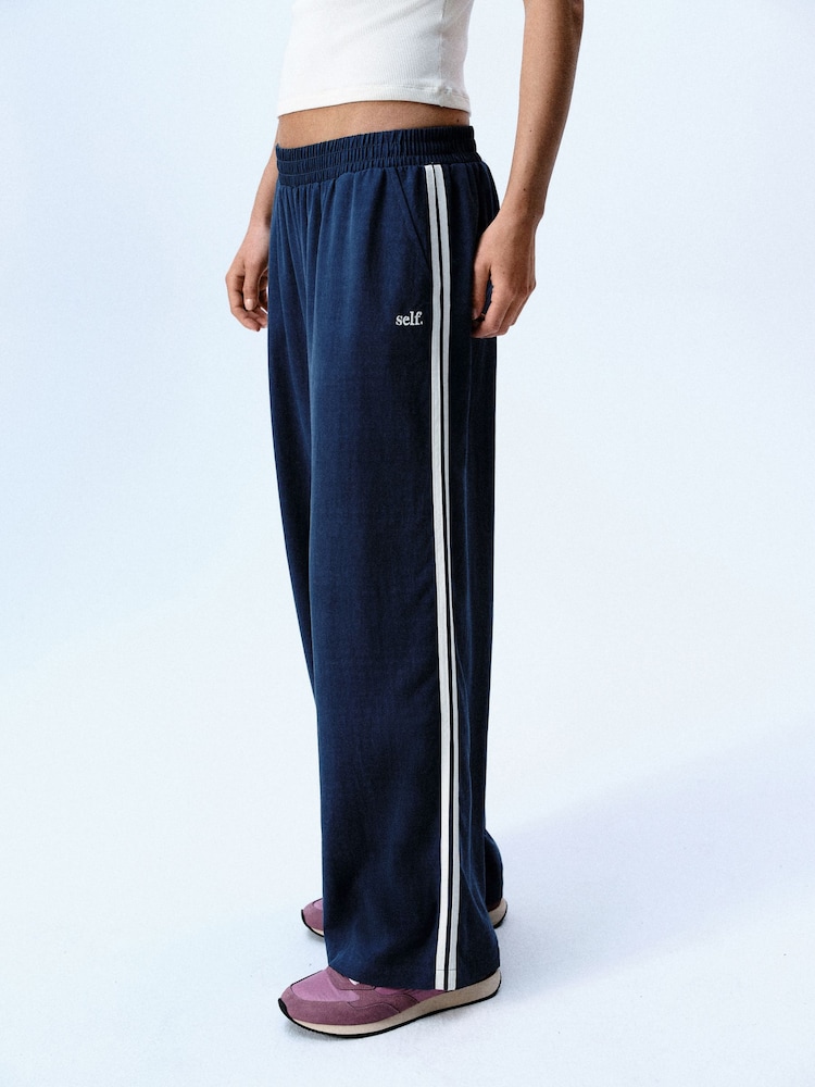 self. Teal Blue Wide Leg Viscose Blend Track Trousers With Side Stripe - Image 1 of 8 self. Teal Blue Wide Leg Viscose Blend Track Trousers With Side Stripe - Image 1 of 8