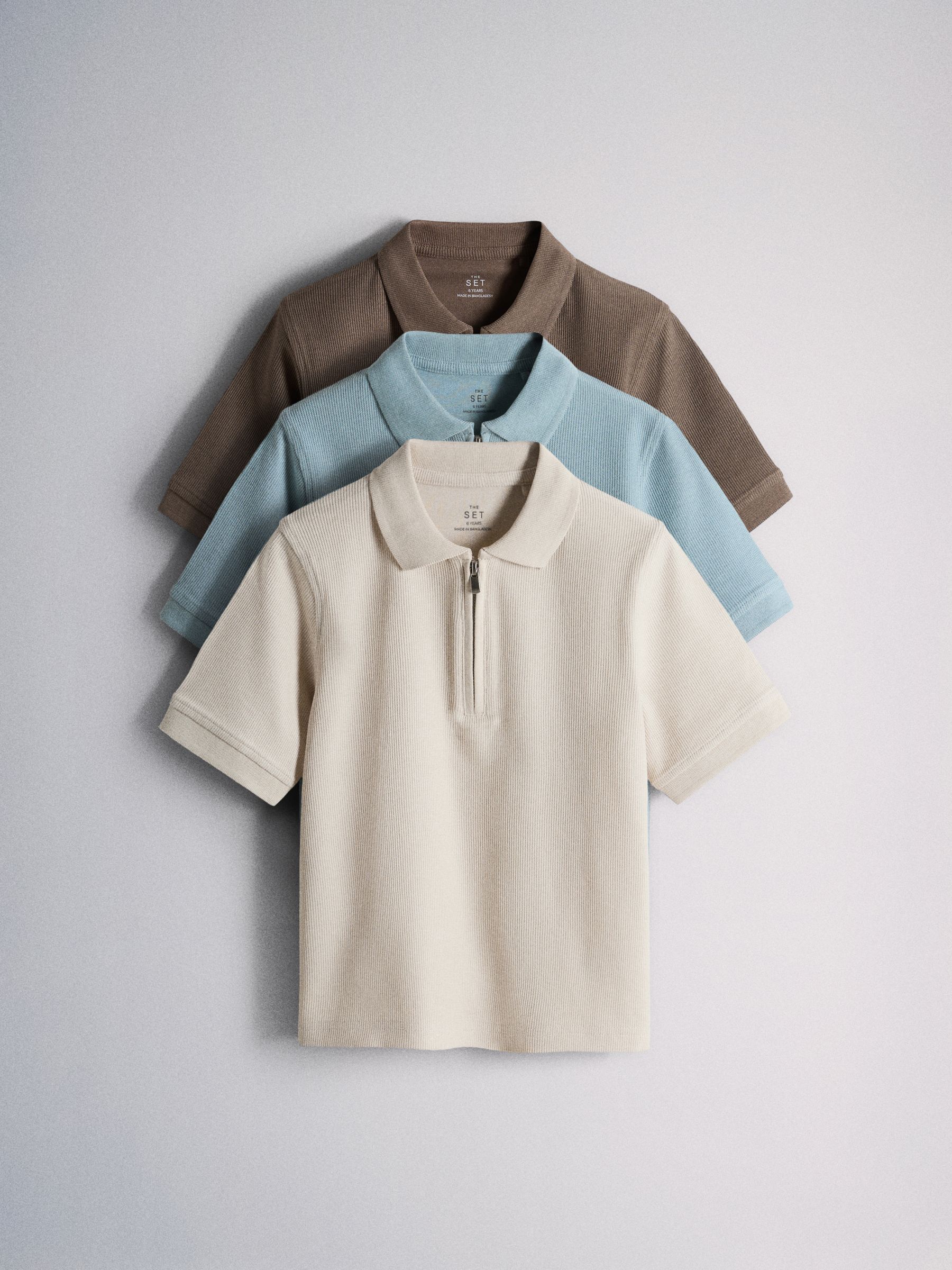 Buy The Set 3 Pack Textured Jersey Zip Neck Short Sleeve Polo