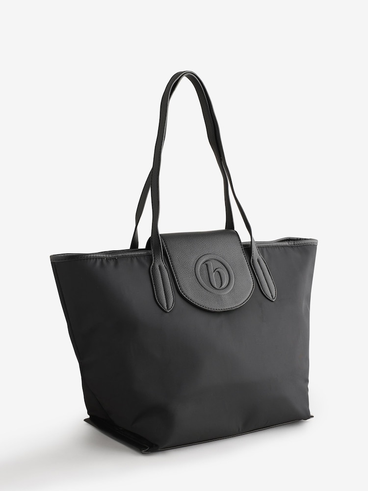أسود - حقيبة توت نيلون من B by Ted Baker - صورة 1 من 7 أسود - حقيبة توت نيلون من B by Ted Baker - صورة 1 من 7