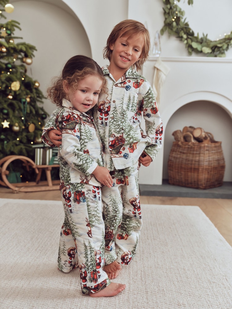 Winter Santa Scene Matching Family Christmas Pyjamas (9mths-16yrs) - Image 1 of 5 Winter Santa Scene Matching Family Christmas Pyjamas (9mths-16yrs) - Image 1 of 5