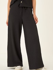 أسود - بنطلون مجعد قابل للتمدد بقصة رِجل واسعة من Roman - صورة 4 من 5