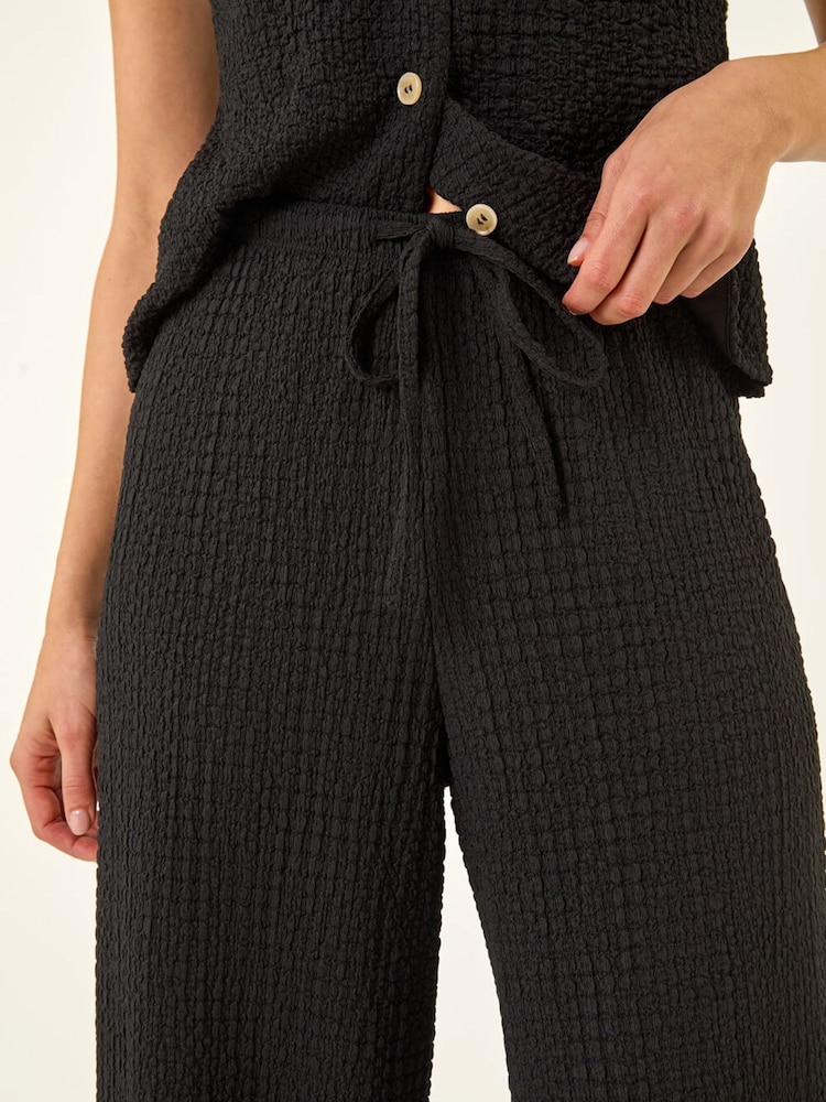 أسود - بنطلون مجعد قابل للتمدد بقصة رِجل واسعة من Roman - صورة 5 من 5