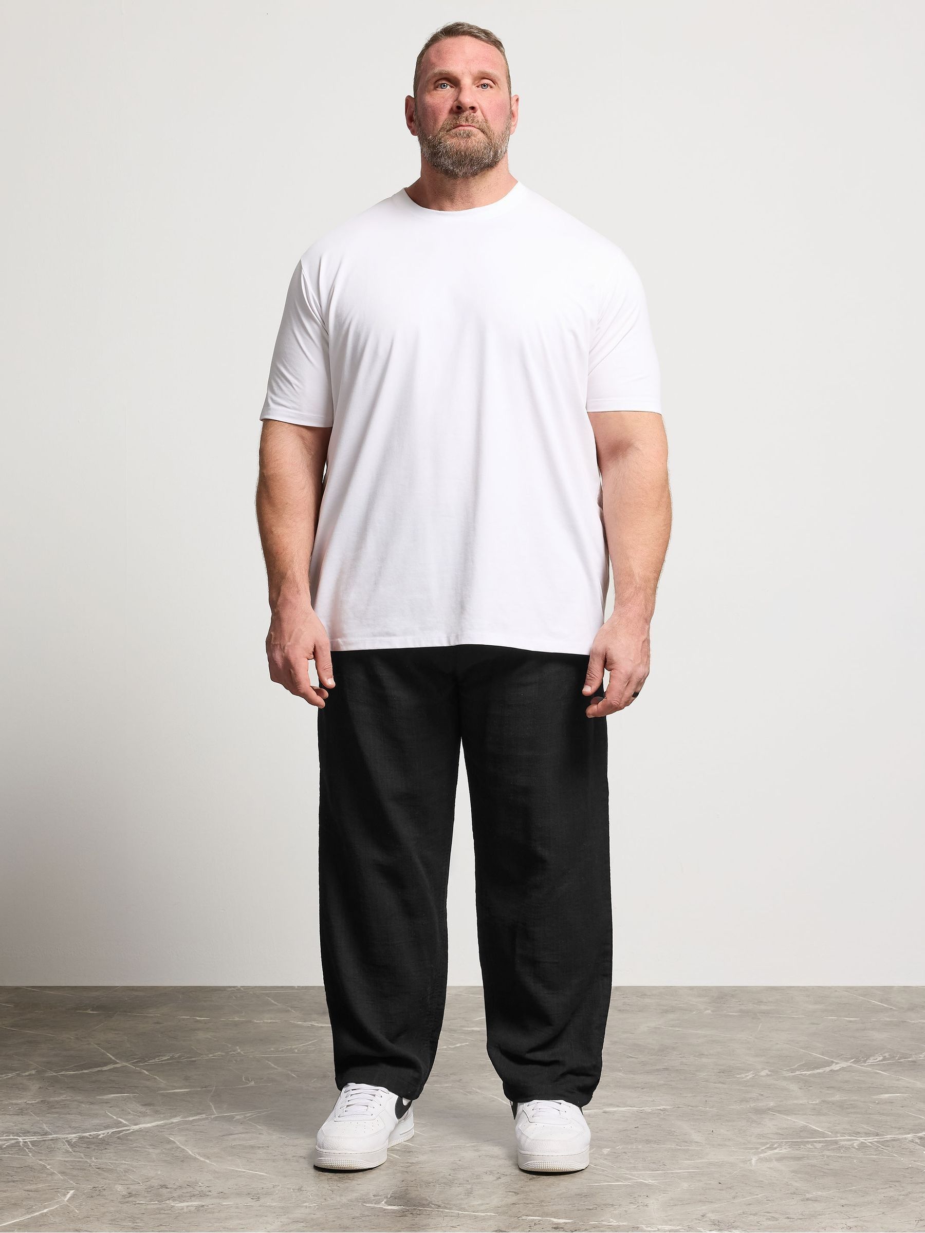 Badrhino Big & Tall Men's Black Chrome Textured Dobby Trousers - Image 1