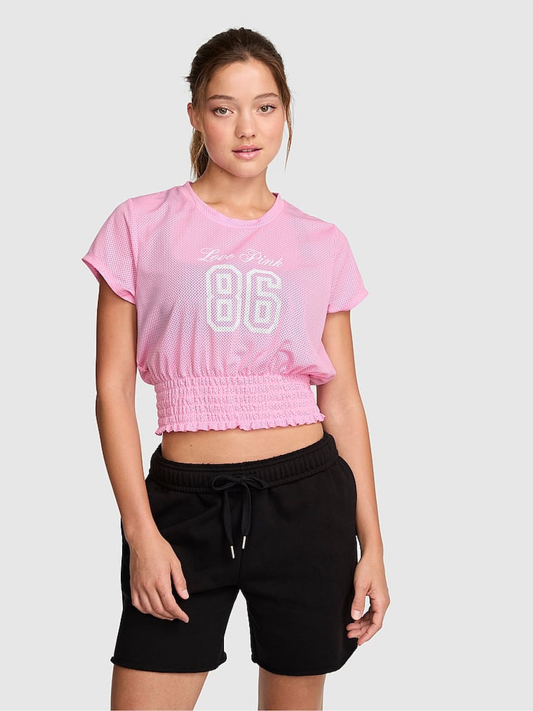 Victoria's Secret Pink Pink Lollipop Smocked Mesh Jersey Top - Image 1 of 3 Victoria's Secret Pink Pink Lollipop Smocked Mesh Jersey Top - Image 1 of 3