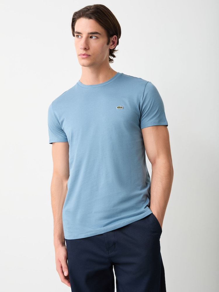 Hellblau - Lacoste Baumwoll-T-Shirt mit Rundhals und Kurzarm - Bild 1 von 4 Hellblau - Lacoste Baumwoll-T-Shirt mit Rundhals und Kurzarm - Bild 1 von 4