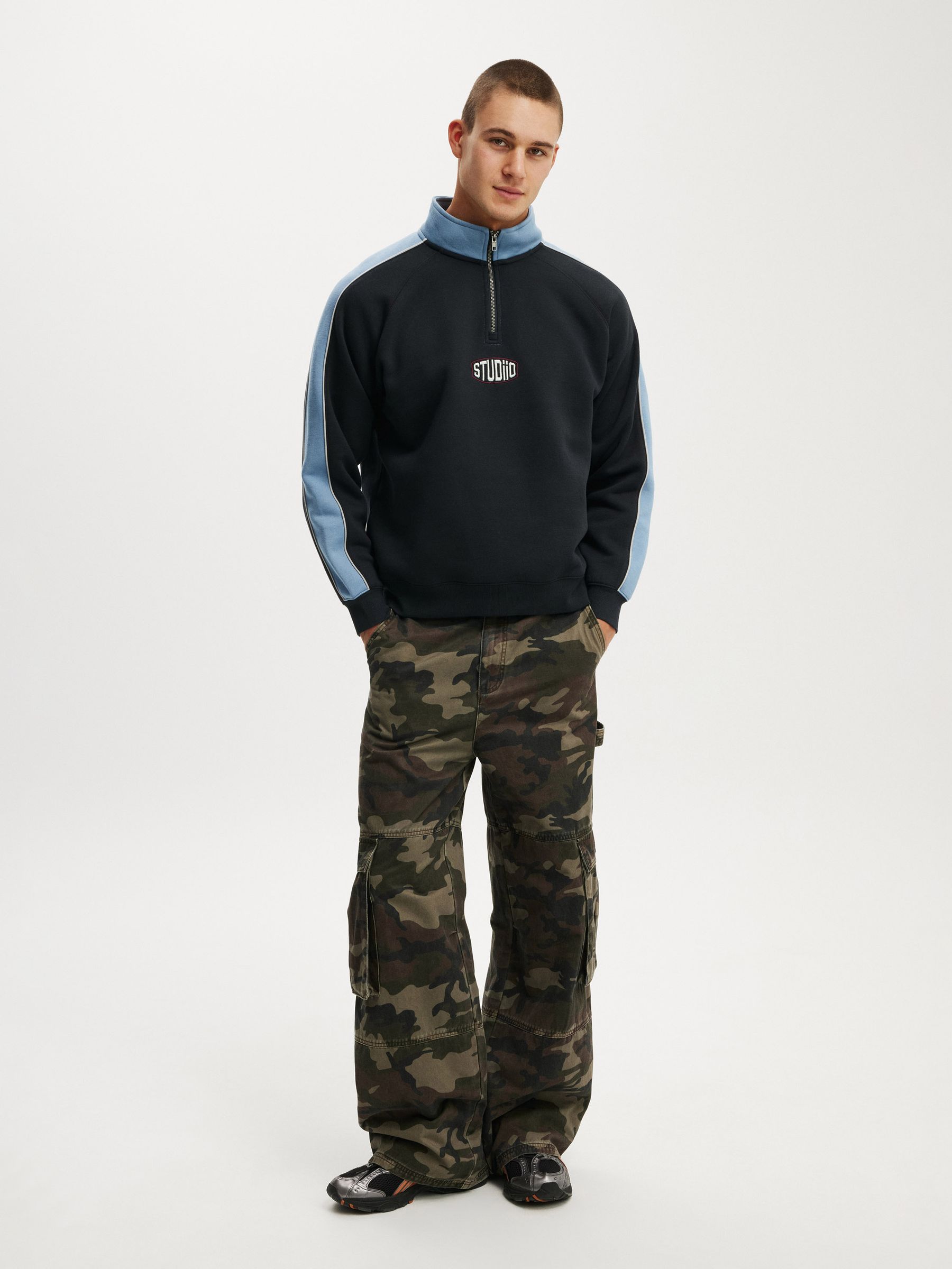 Buy Cotton On Washed Black/Studio Graphic Quarter Zip Sweatshirt