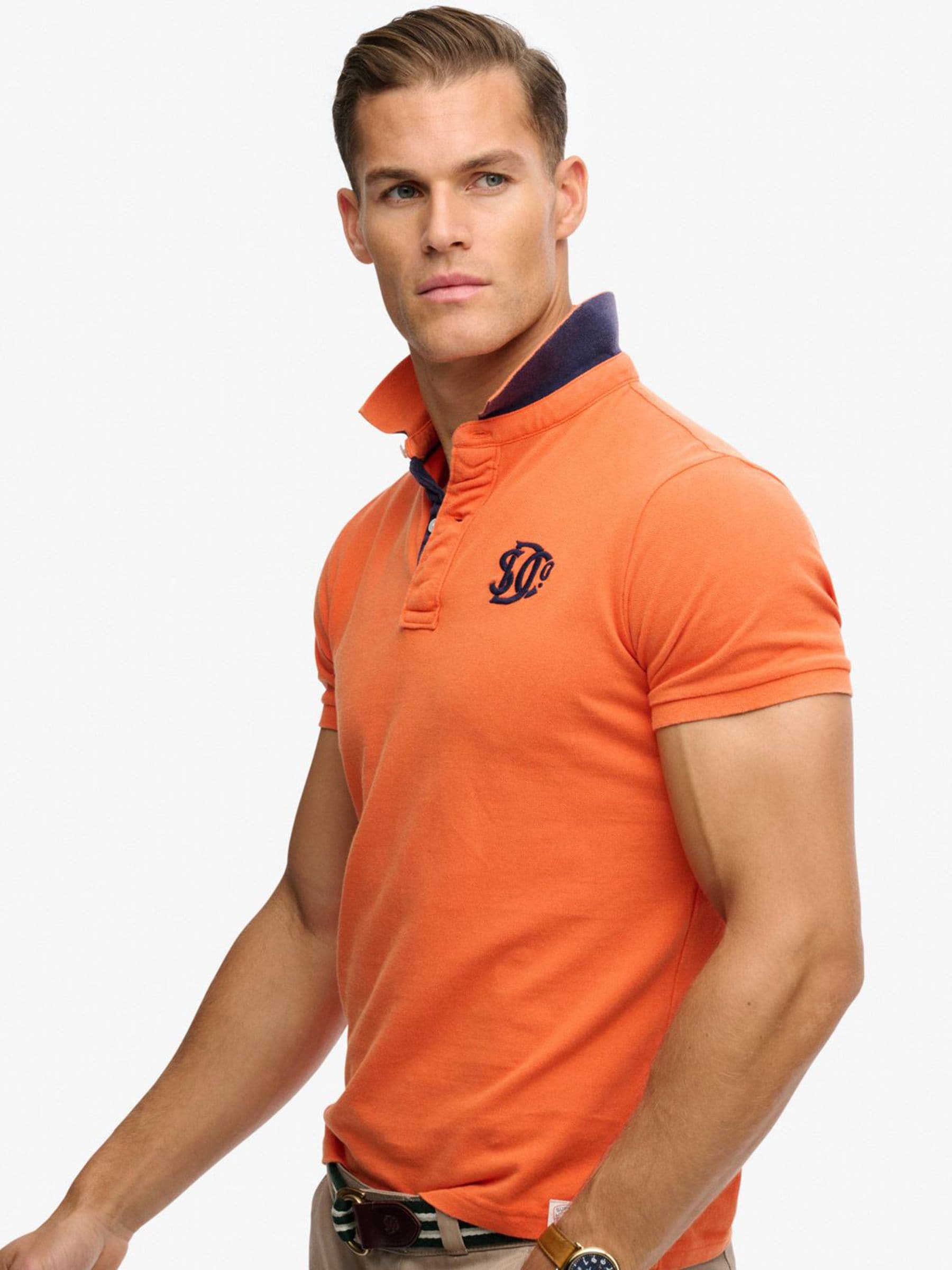 Buy Superdry Orange Pique Monogram Polo Shirt from the Next UK