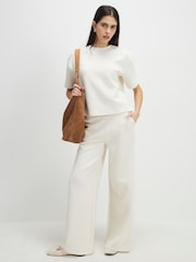 بنطلون رياضي جاكار برِجل واسعة بخصر قابل للتمدد من River Island - صورة 2 من 4