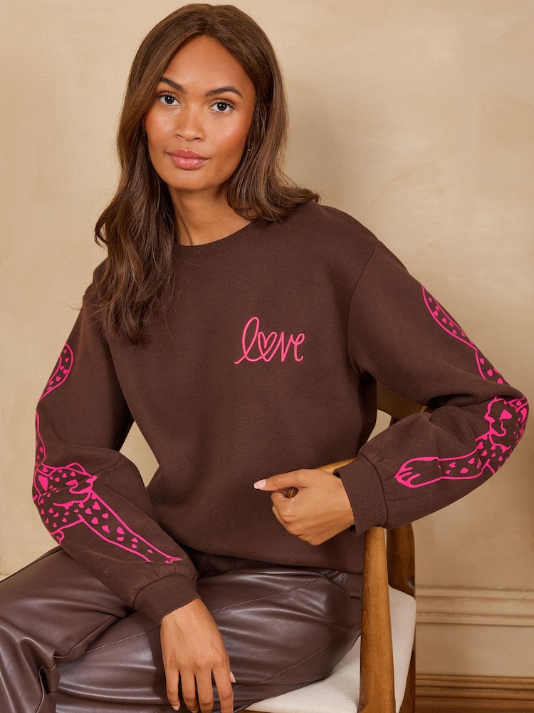 Love & Roses Chocolate Brown Cheetah Sleeve Jersey Sweatshirt - Image 1 of 5