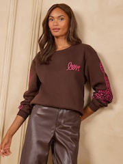 Love & Roses Chocolate Brown Cheetah Sleeve Jersey Sweatshirt - Image 4 of 5