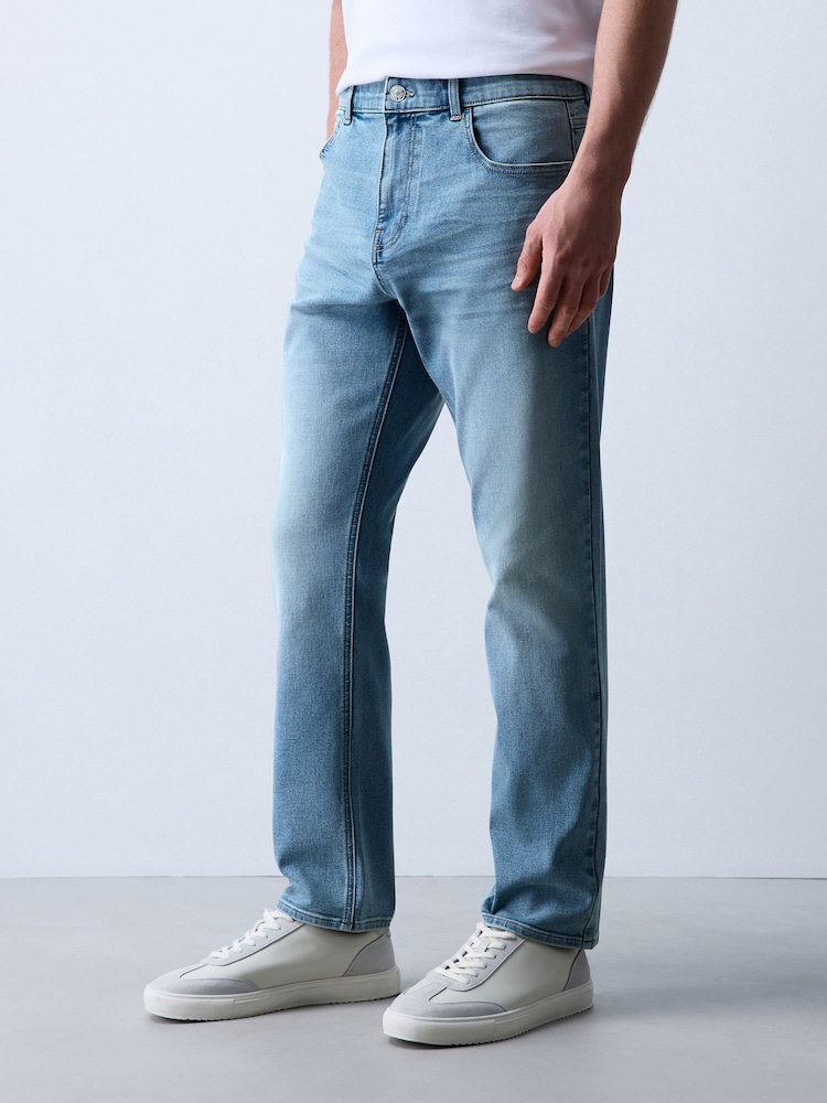 Light Blue Slim Fit Essential Stretch Jeans - Image 1 of 11 Light Blue Slim Fit Essential Stretch Jeans - Image 1 of 11